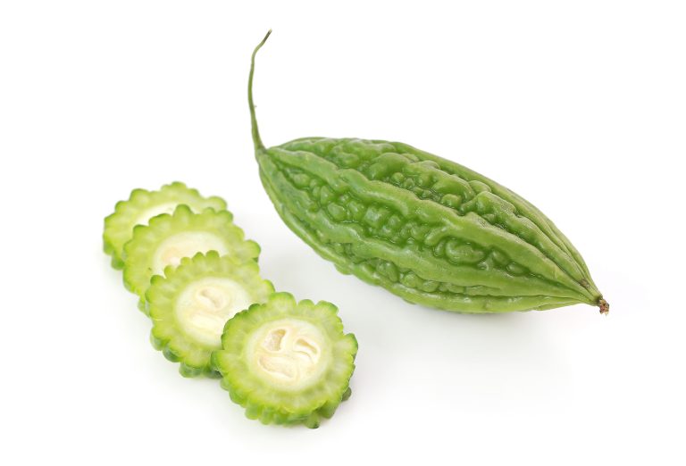 high angle view green fruit against white background