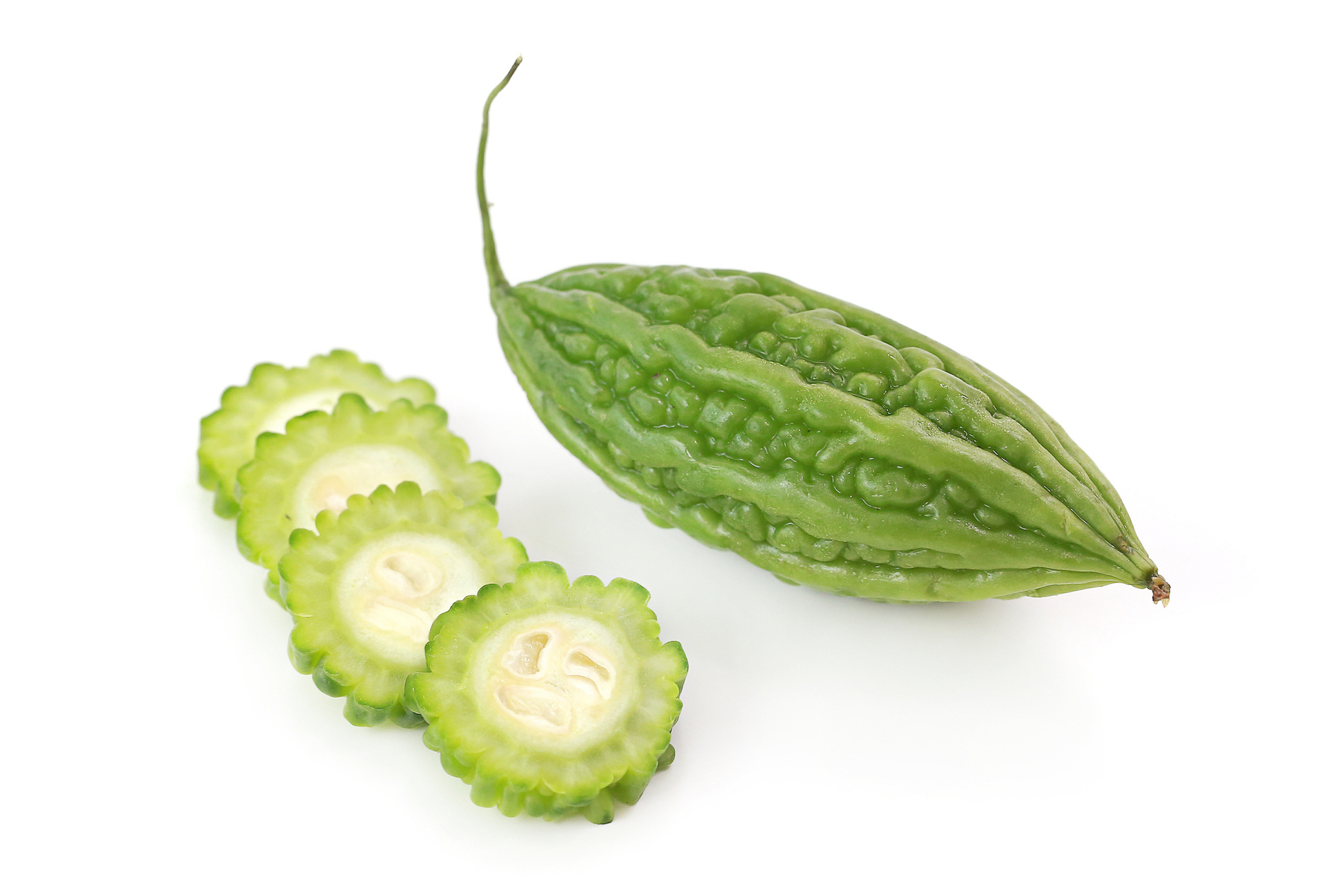 high angle view green fruit against white background
